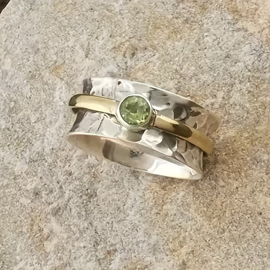 Elegante anello con zircone verde