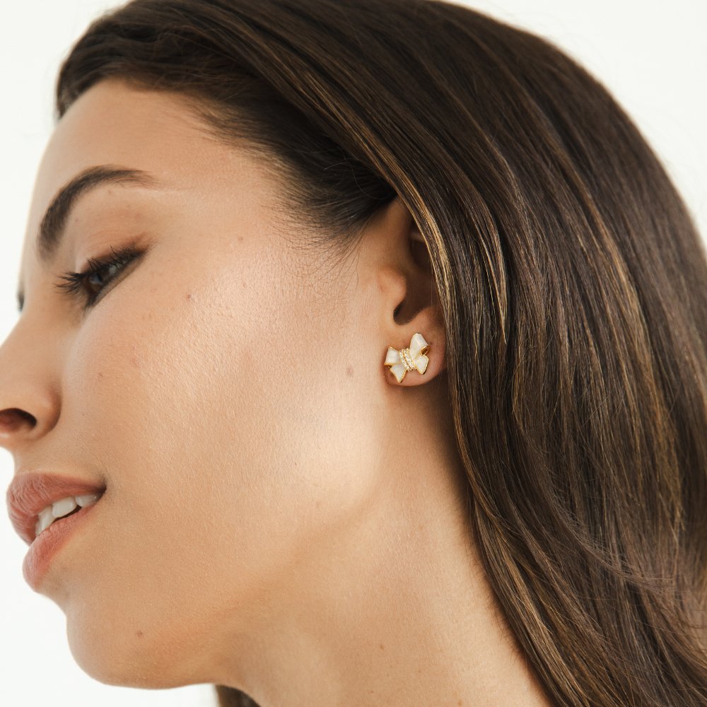 Orecchini a fiocco con cristalli bianchi