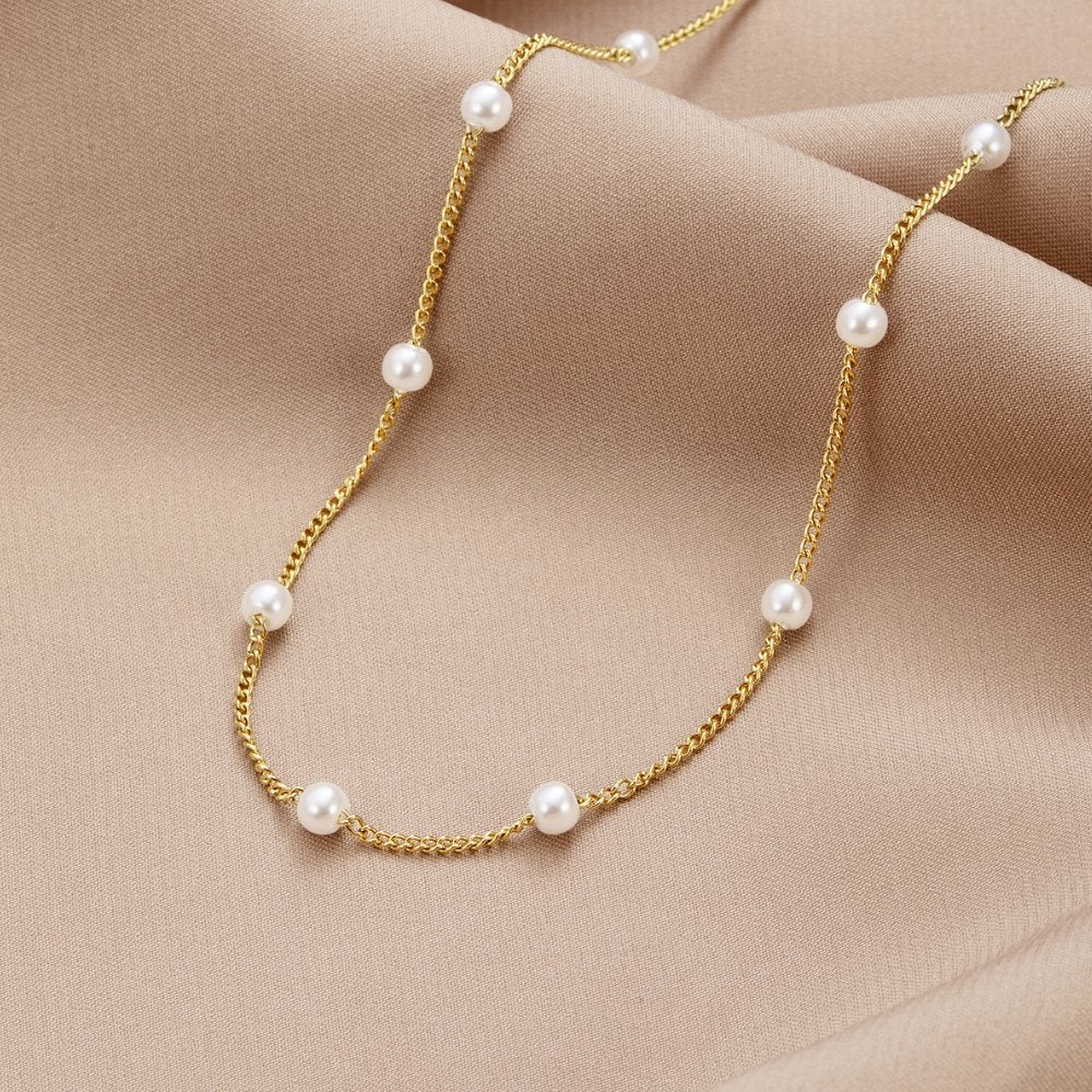 Reine – Collana di perle dorata